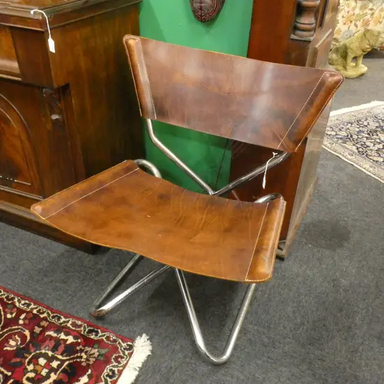 ERIK MAGNUSSEN 'Z-DOWN' FOLDING CHAIR IN CHROME (some pitting) & BROWN LEATHER