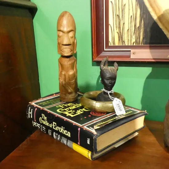 2 BOOKS; 'JU-JU IN MY LIFE', 'THE CRADLE OF EROTICA' + A BRONZE TRIBAL BANGLE + 2 CARVED WOODEN FIGURES
