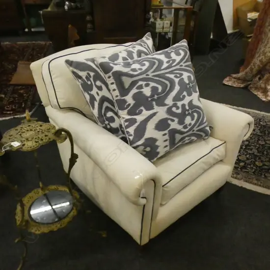 ARMCHAIR UPHOLSTERED IN WHITE LINEN w. BLUE IKAT CUSHION