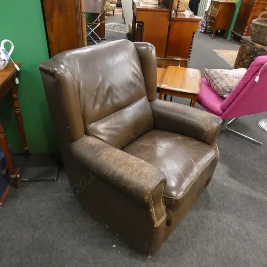 BROWN LEATHER ARMCHAIR