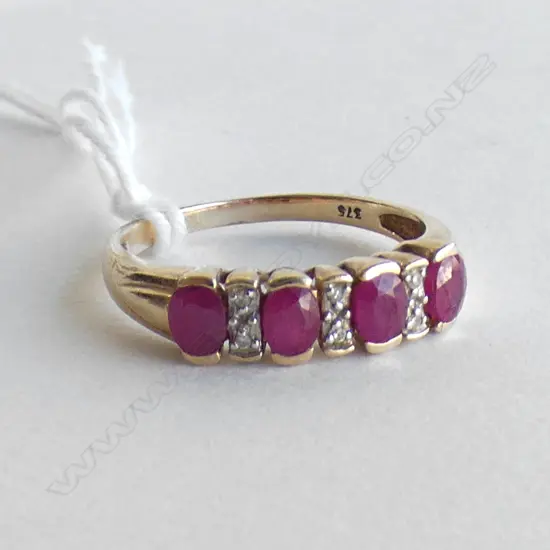 9CT RUBY (COMMERCIAL GRADE) & DIAMOND RING 2.6 GRAMS