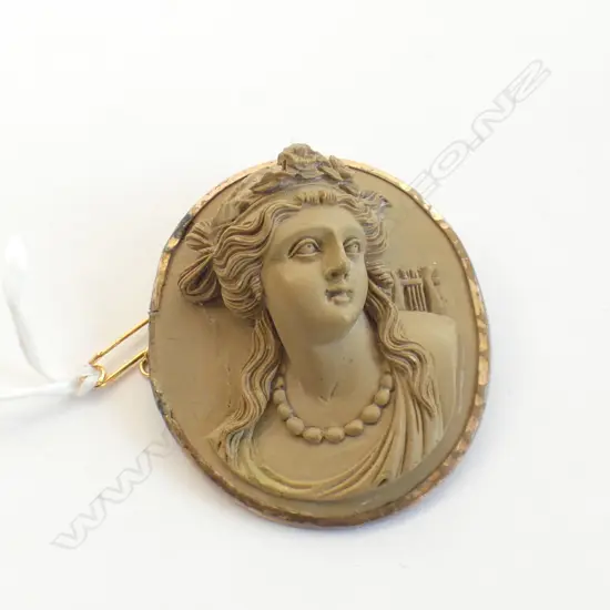 A Victorian lava cameo of a classical woman
