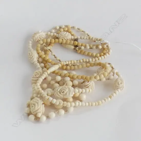 THREE IVORY BEADED NECKLACE, ONE WITH CARVED ROSES , LONGEST: 750mm