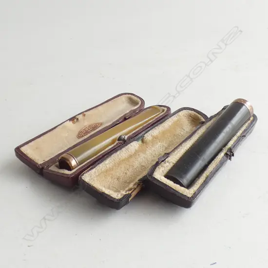 2 9CT GOLD MOUNTED CIGARETTE HOLDERS IN CASES, ONE HALLMARKED BIRM1901