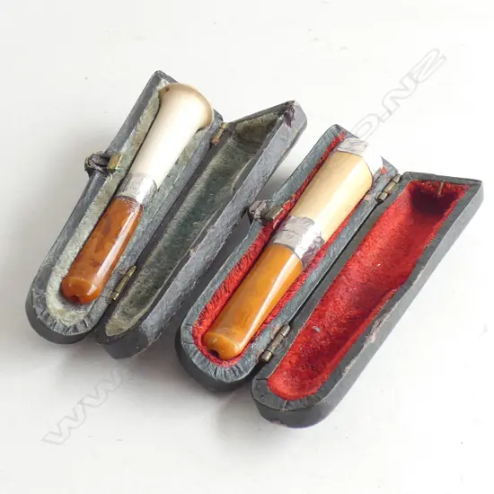 TWO ANTIQUE STG SILVER MEERSCHAUM & AMBER CIGAR HOLDERS IN CASES 