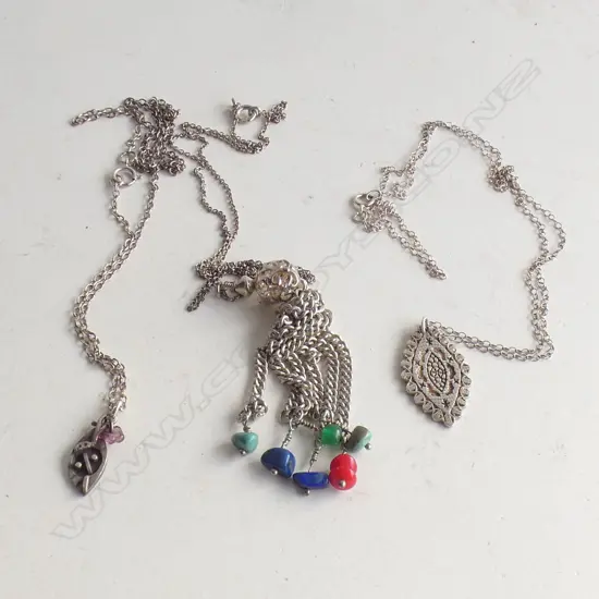 3 SILVER PENDANT NECKLACES. TRIBAL MASK + GEM STONES + INDENTED LOZENGE FORM