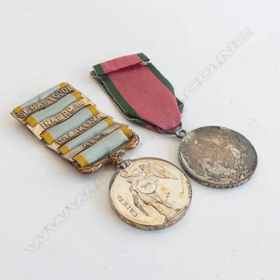 REPLICA CRIMEA WAR MEDAL w CLASPS & TURKISH CRIMEA MEDAL (both named)  to GUN G. CAMWELL R.H.A
