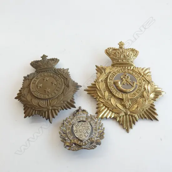NZ VOLUNTEERS HELMET PLATE, ANOTHER, and 5th M.R. OTAGO HUSSARS CAP BADGE