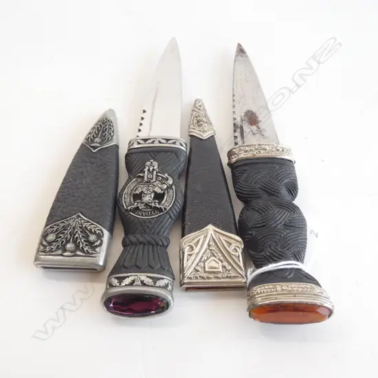 2 SCOTTISH SGIAN-DUBHS, w sAW BACKED SINGLE EDGED BLADES. eACH w SIMULATED CAIRNGORMS TO HILTS. L.190mm & 200mm