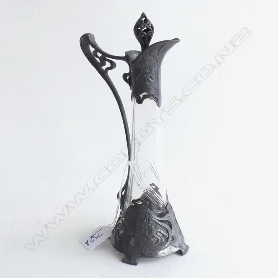 MINIATURE CLARET JUG.EARLY 20THC WMF MANUFACTURE TYPICAL NOUVEAU PATTERN  FEMALE HEAD IN PROFILE 240MM HIGH