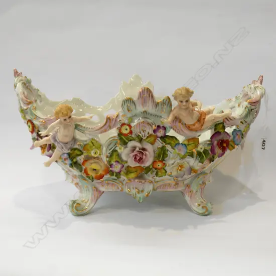 EARLY 1900'S ANTIQUE GERMAN BOWL ENCRUSTED WITH PORCELAIN FLOWERS & APPLIED CHERUBS 285 X 200MM