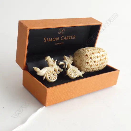 IVORY CLIP ON EARRINGS AND SMALL CRICKET CAGE?