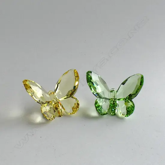 TWO SWAROVSKI CRYSTAL BUTTERFLY'S; 1 MOSS GREEN ANAMOSA & AMBER GLASS (W65MM) BOTH IN ORIGINAL BOXES, 1 W SLEEVE