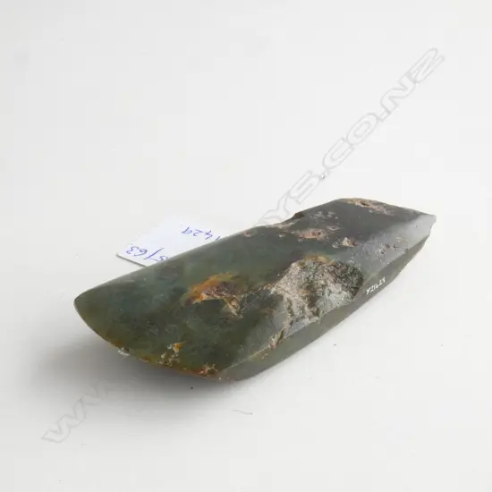 Complete adze. Quadrangular cross section. Finely ground front