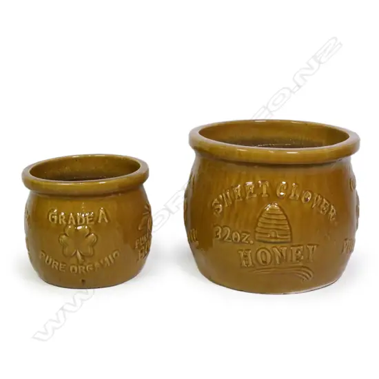 A pair of graduated ‘Honey Pot’ pottery garden pots,