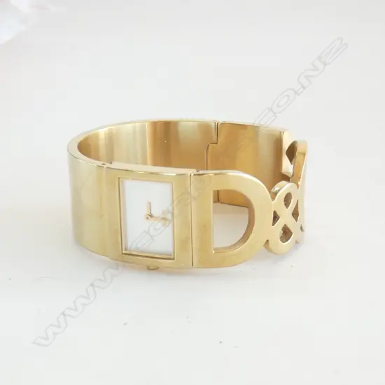 LADIES DOLCE AND GABBANA WATCH. CIRCA 1990 (ORIGINAL BOX AND POUCH INCLUDED – VERY WORN). 