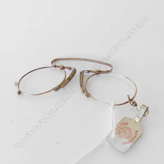 GOLD FILLED SPECTACLE FRAMES PINCENEZ WITH ORIGINAL ANTIQUE LABLE ATTACH.