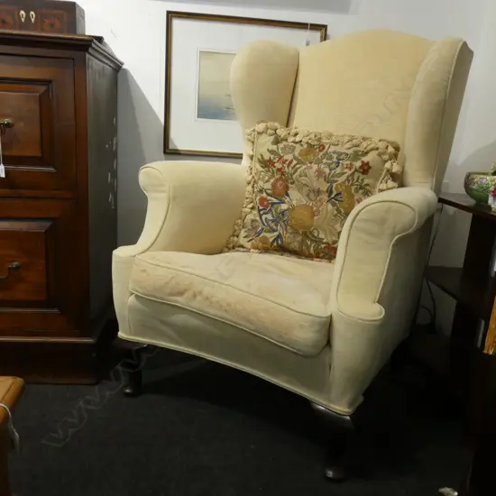 WING BACK ARMCHAIR SOME MARKS TO SQUAB + SQUARE TASSELLED NEEDLEWORK CUSHION