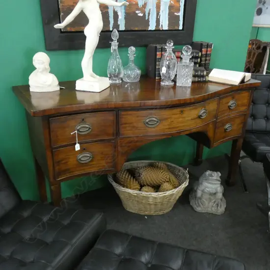 REGENCY SERPENTINE MAHOGANY SIDEBOARD