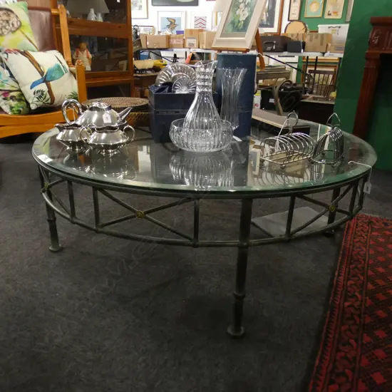 CIRCULAR GLASS TOPPED (CHIPS) BRONZED METAL COFFEE TABLE 1200mm dia