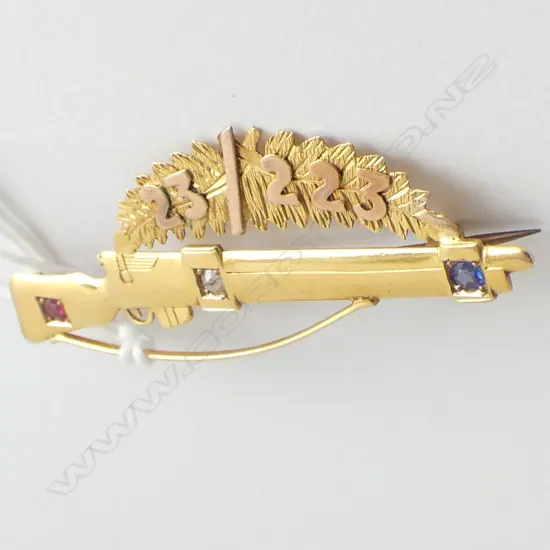 9CT GUN BROOCH 3.5 GRAMS