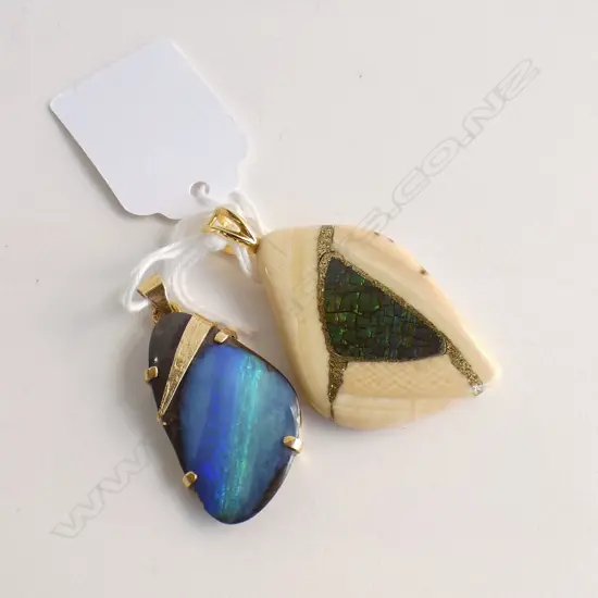 TWO PENDANTS; OPAL WITH GOLD CASING + ONE OTHER