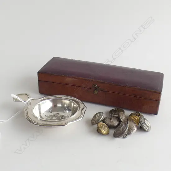 SILVER TEA STRAINER AND U.S.S.C. BUTTONS