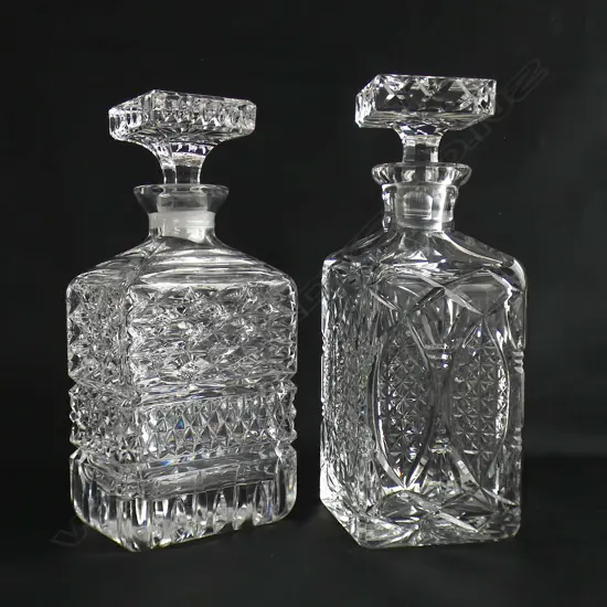 TWO SQUARE CUT GLASS DECANTERS H 225MM
