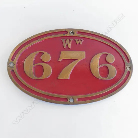 BRONZE & RED ENAMEL OVAL RAIL SIGN '676' 420x260mm