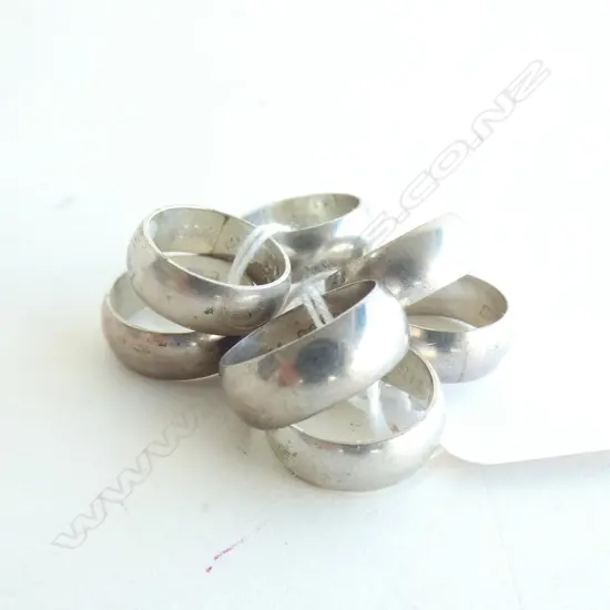 7 SMALL STG SILVER RINGS 31 GRAMS