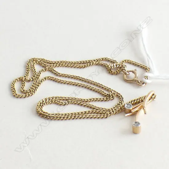 (17883) 9CT GOLD PENDANT W 2 SMALL DIAMONDS ON GOLD PLATED CHAIN