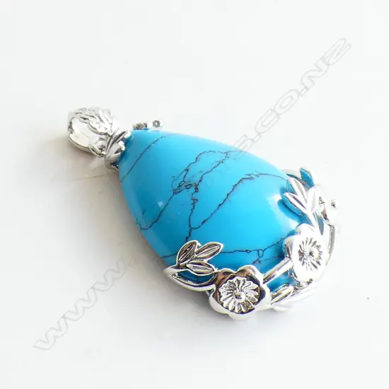 SILVER TONED AND FAUX TURQUOISE PENDANT 