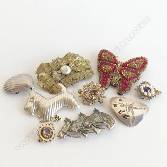 BAG ASST VINTAGE BROOCHES INCL BEADED BUTTERFLY, STG & PAUA BALLERINA,SCOTTIE DOG, HORSES ETC..