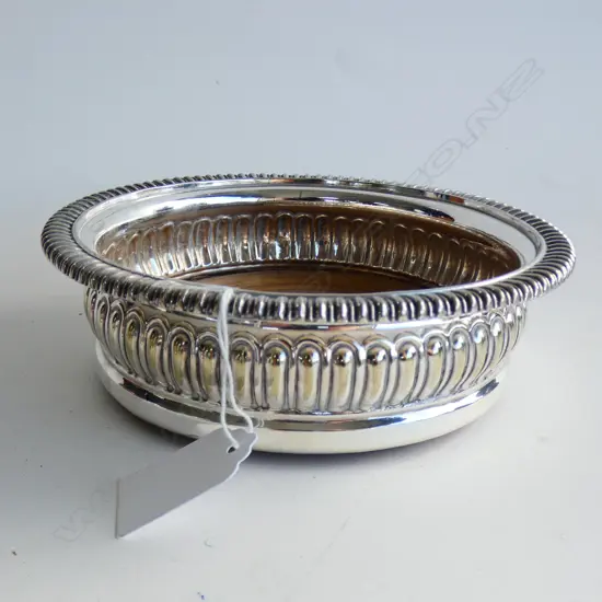 ANTIQUE O.S.P. BOTTLE COASTER lobed sides. turned wooden base