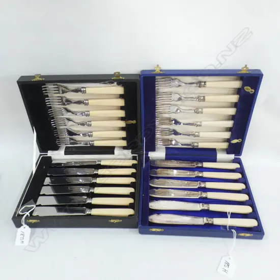 2 BOXED SILVER PLATED FISH SETS (ONE BLUE BOX ONE BLACK BOX)