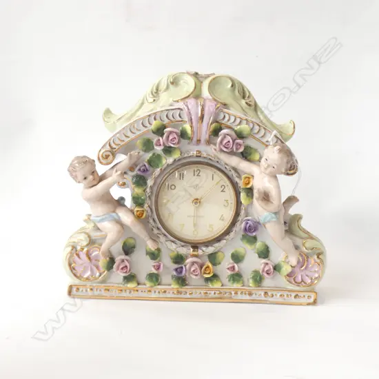 ITALIAN STYLE PORCELAIN MANTLE CLOCK WITH CHERUBS & FLOWERS L 220MM
