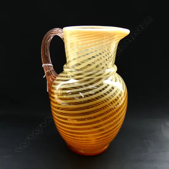 HAND BLOWN GLASS JUG, INTERNAL SPIRAL VASELINE PATTERN & PUCE COLOURED HANDLE, GROUND PONTIL H.245mm