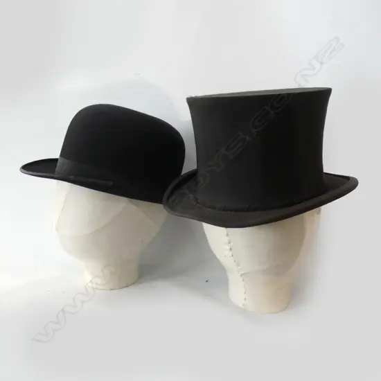 2 VINTAGE BLACK HATS ON CLOTH HEADS