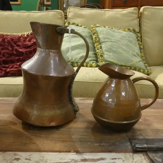 2 VINTAGE COPPER JUGS H.280mm