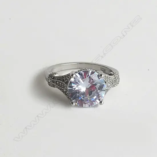 LARGE FAUX DIAMOND RING SET IN SILVER