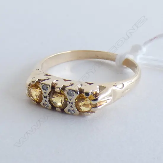 9CT GOLD AND THREE CITRINE AND DIAMOND RING SIZE N 1/2 2.7gm