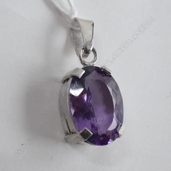 AMETHYST SILVER MOUNTED PENDANT