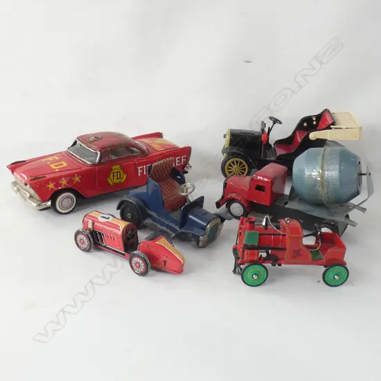 BOX OF 6 TIN TOYS INCLUDES FIRE CHIEF CAR AND OTHERS