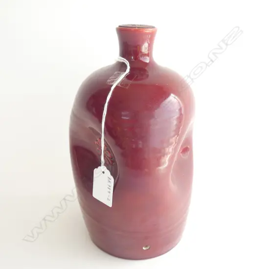 CHRISTOPHER DRESSER RED GLAZED VASE DRILLED