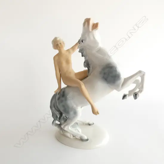 GERMAN PORCELAIN FIGURE, NUDE ON HORSEBACK H.270mm
