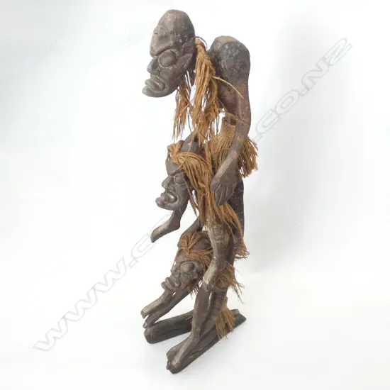 CARVED WOODEN TRIBAL SCULPTURE 3 MEN STACKED H.810mm