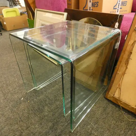3 GLASS NESTING TABLES...