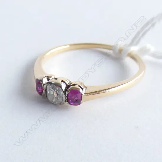 18CT 2 RUBY & OLD CUT DIAMOND RING. The diamond fitted later