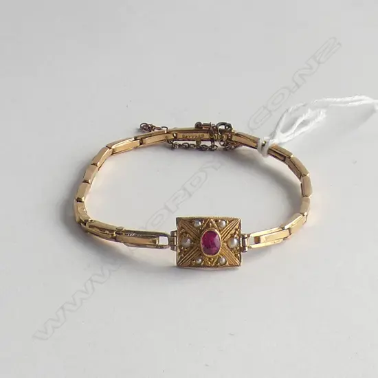 (17774) 18CT GOLD SPRUNG BRACELET RED STONE & SEED PEARLS