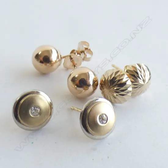 3 prs gold studs  (one butterfly missing)